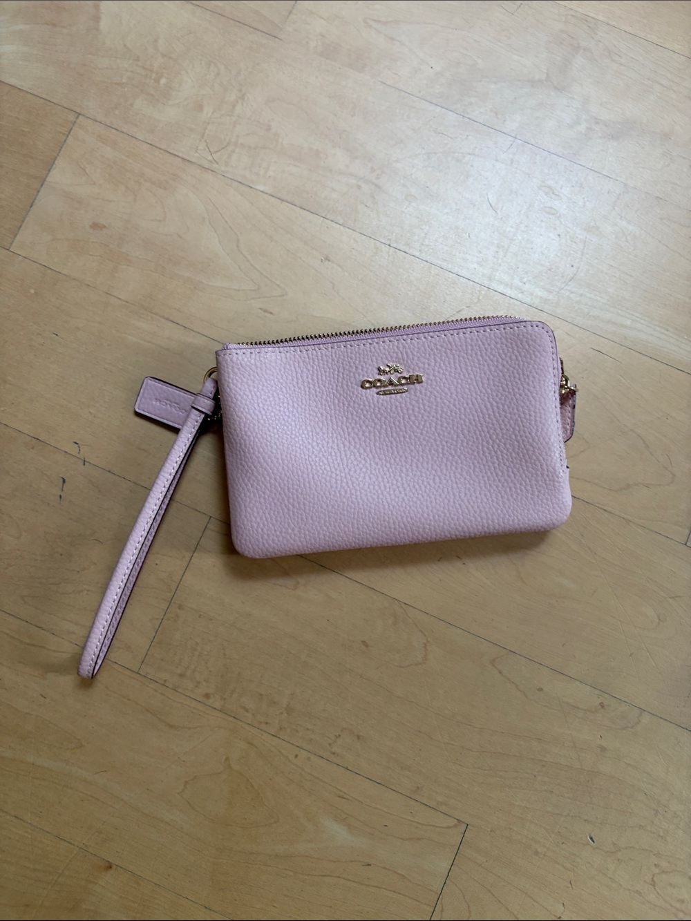 Coach Light Pink Pebbled Leather Wristlet with Gold Logo